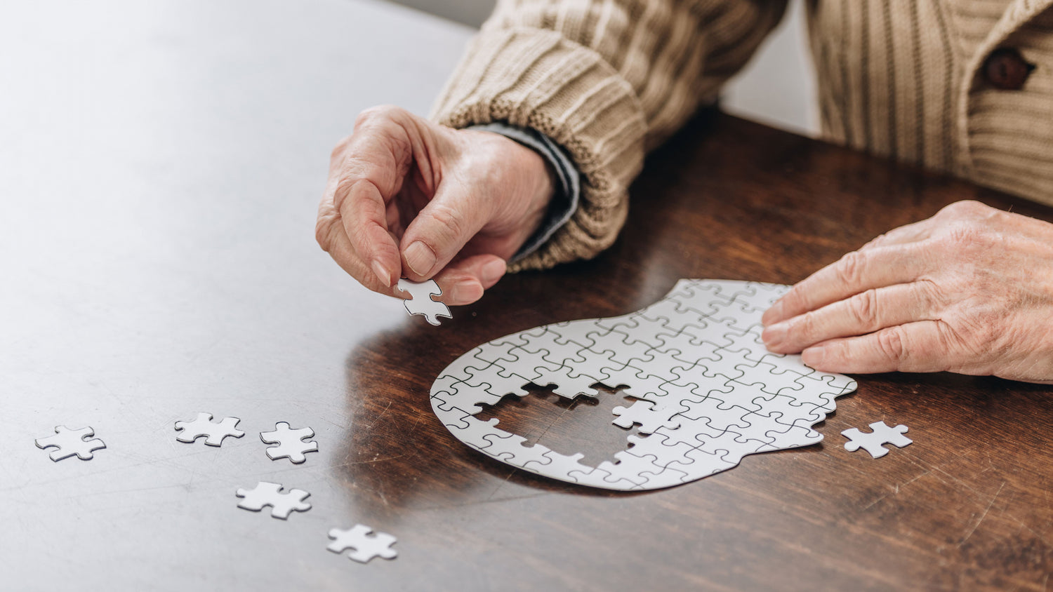 Puzzle in Form eines Kopfes